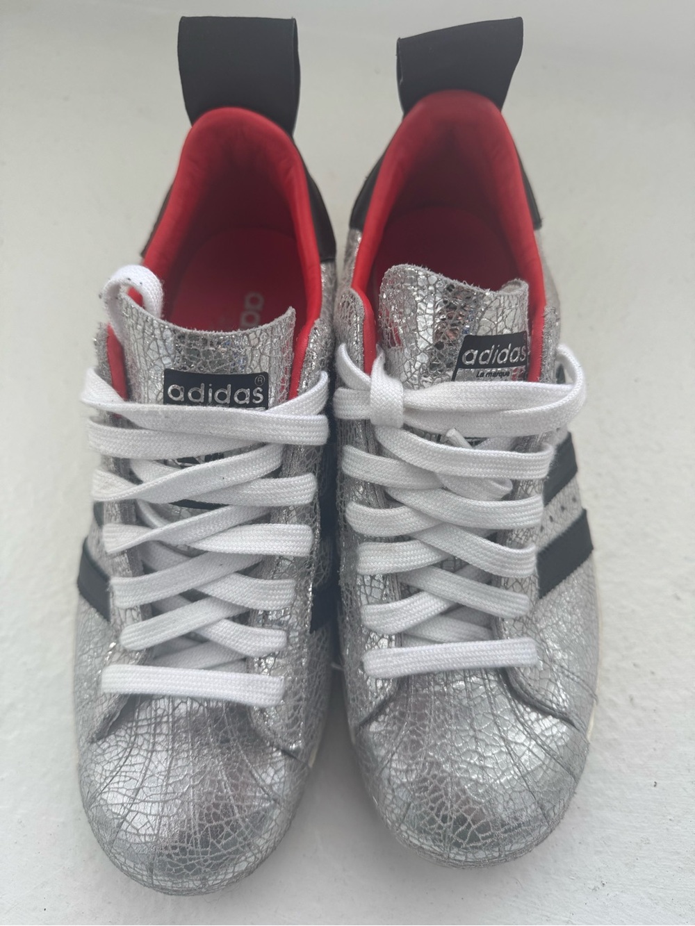 adidas Silver Metallic Sneakers with Black Stripes and Red Lining